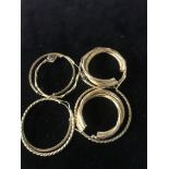 Four pairs of 9ct hoop earrings