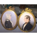 A pair of 19th century portrait miniatures depicting a lady & gentleman