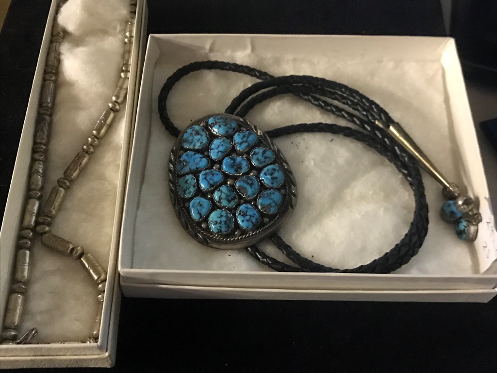 A Native American turquoise necktie and silver necklace CONDITION REPORT: In perfect