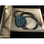 A Native American turquoise necktie and silver necklace CONDITION REPORT: In perfect