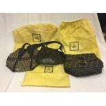 Three Fendi handbags