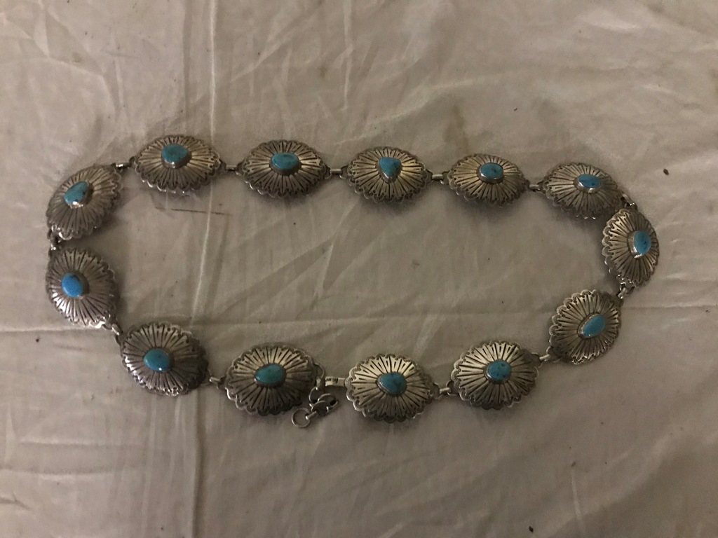 A Native American silver and turquoise belt