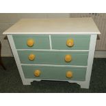 A painted pine chest of drawers two over three