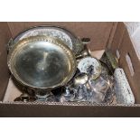 A box containing silver plated items