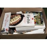 A box containing cookery books