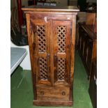 A hardwood media cabinet, matches lot 22