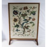 A firescreen with embroidered panel