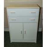 A tallboy two drawers over cupboards