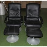 Two leather swivel armchairs and foot rests