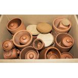 A box containing earthenware storage jars