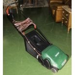 A Qualcast electric lawn mower