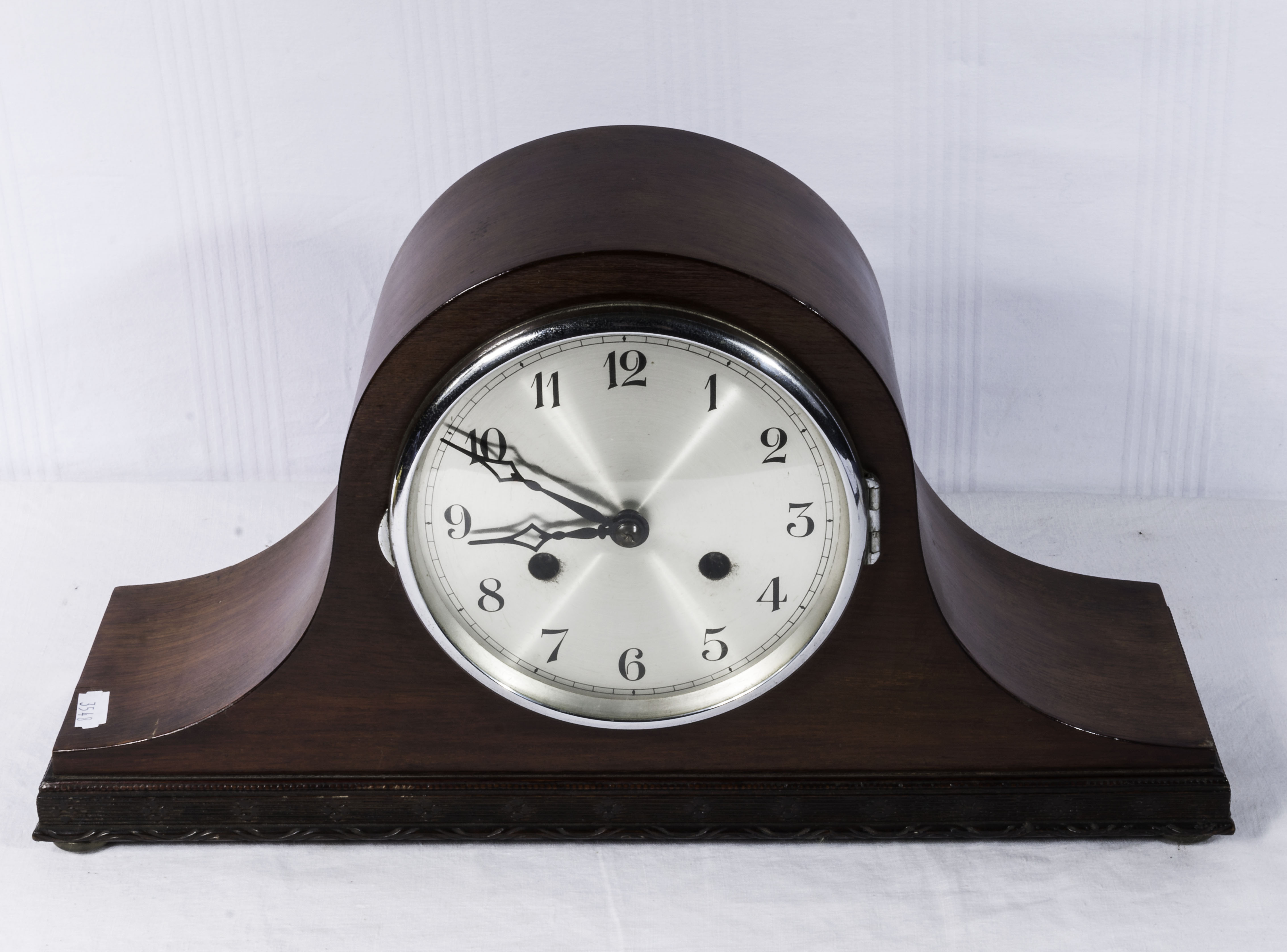 A Mahogany Napoleon hat clock.