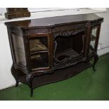 An Edwardian dark mahogany side cabinet.