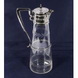 An etched glass and silver plated claret jug