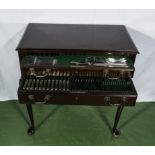 A vintage mahogany cutlery table fitted with a full 12 place set silver plated cutlery 133 pieces