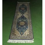 A blue ground wool runner