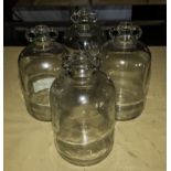 Four demijohn bottles