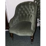 A late Victorian upholstered armchair