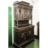 A carved oak European cabinet