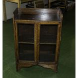 An oak two door wall cabinet 90cm by 60cm.