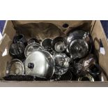 A box containing silver plated items