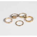 Three 9ct gold wedding bands and two others