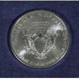 A USA 1oz fine silver one dollar piece, year 2011