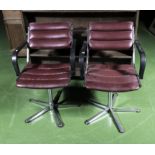 A pair of vintage chrome framed barbers chairs