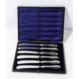 Six silver handled butter knives in fitted case