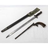 A WWI bayonet with scabbard and frog together with a de-activated pistol