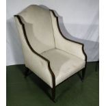 An Edwardian inlaid mahogany arm chair