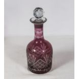 An etched ruby glass decanter