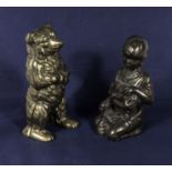 A brass bear money box and one other