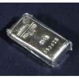 An Umicore Feinsilber, silver 999 ingot, 250gms. Numbered 053626