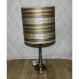 A retro table lamp and shade