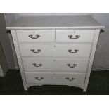 A white painted chest of drawers two over three