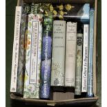 A box containing gardening books