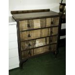 A chest of four drawers