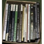 A box containing books on art