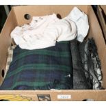 A box of fabric and lady's vintage clothing