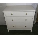 A white painted chest of three drawers