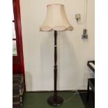 A standard lamp and shade