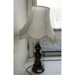 A table lamp and shade