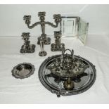 Two silver plated trays, candelabra and candlesticks, egg cups and other items