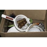 A box containing kitchen items and utensils