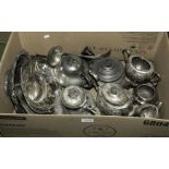 A box of silver plated ware