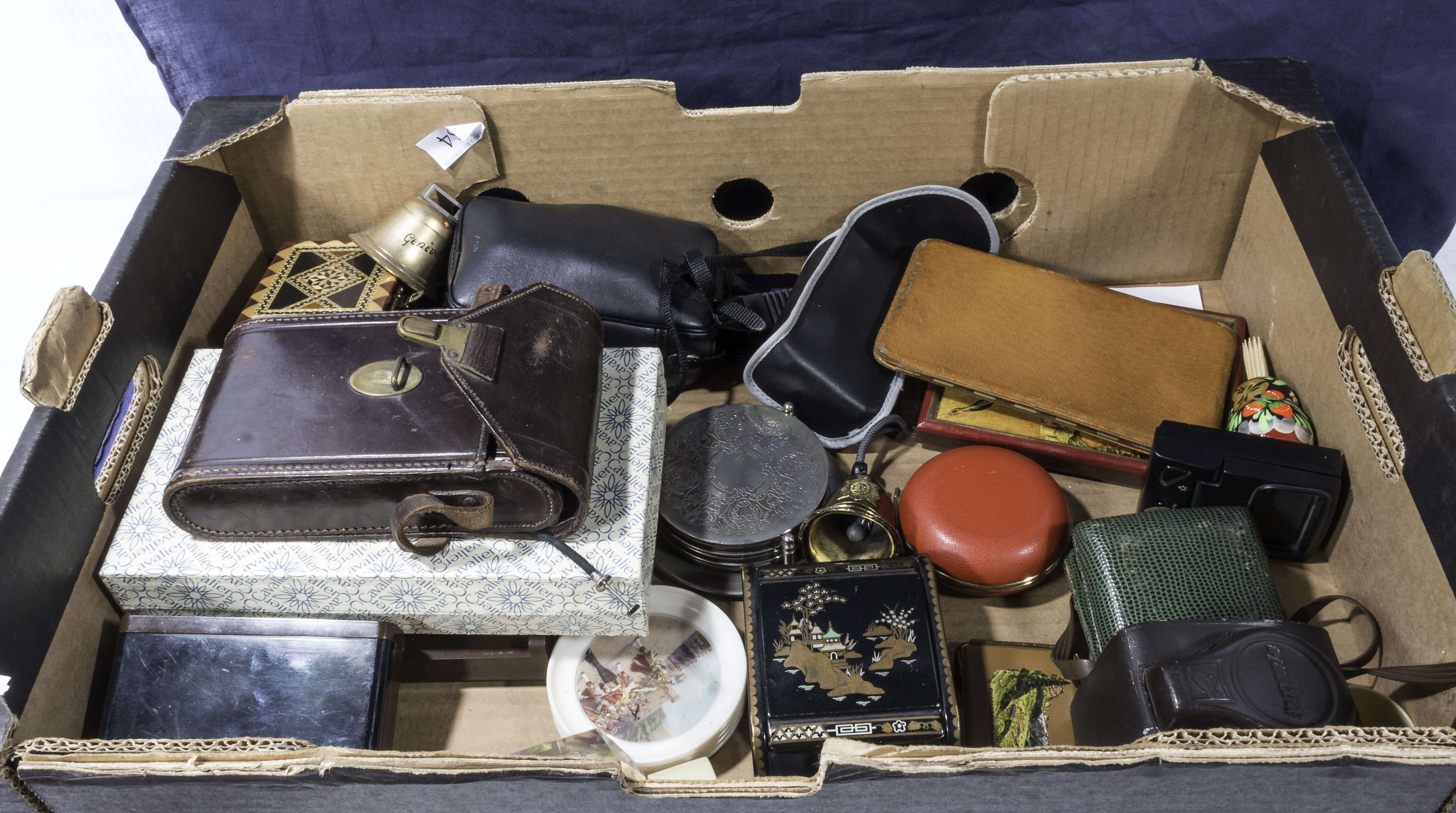 A box of assorted collectable items