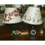 A pair of table lamps and shades