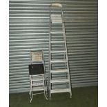 Step ladders and two pairs of steps