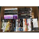 A box containing books and DVD's for teenagers